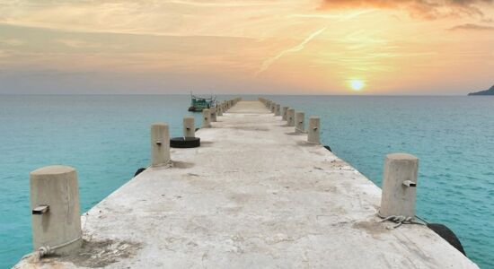 Panoramic view of Koh Rong’s white sand beaches for a scenic Koh Rong Tours banner by Legend Travel Group.